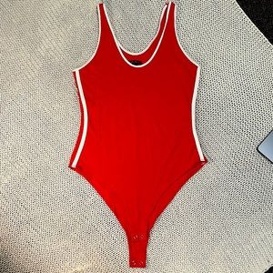 Red one piece body suit with white stripes from wild fable